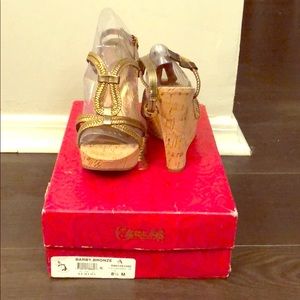 New, never worn wedges, with box.